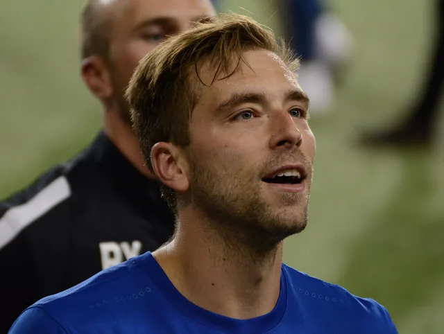 A portrait of Matt Bahner , a defender for United Soccer League side FC Cincinnati . Bahner is facing the crowd in the east stands of Nippert Stadium in Cincinnati, who are cheering after FC Cincinnati upset Chicago Fire SC of Major League Soccer . The match took place on June 28, 2017, and was part. How to think about athlete lookalikes pairs