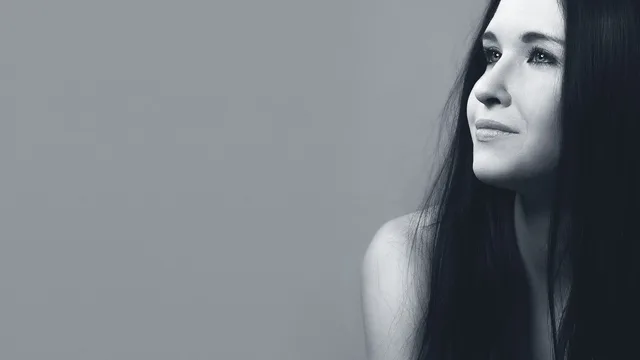 girl, portrait, smile, hair, model, person, woman, female, long hair, profile, monochrome, black and white, studio photography, smile, smile, smile, smile, smile, hair, hair, hair, profile, profile. What a photograph hides in a lookalike comparison: distance, light, expression