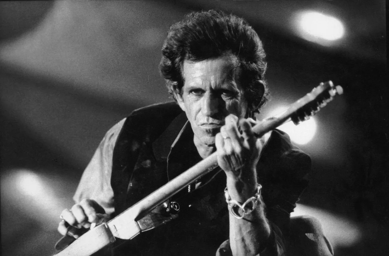 keith richards, the rolling stones, concert, voodoo lounge tour, 1995, black and white, guitarist, rock, singer, music, electric, star, celebrity, keith, richard, rolling stones, gray music, gray stars, gray rock, gray concert, gray stone, gray celebrate, keith richards, rolling stones, rolling stones, rolling stones, rolling stones, rolling stones. Musician Lookalike Submissions: The Desk's Five Questions